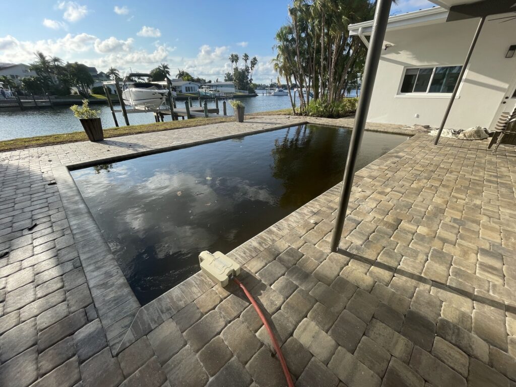 An image of Hurricane Pool Restoration Services from Gulf Coast Pool Pros.